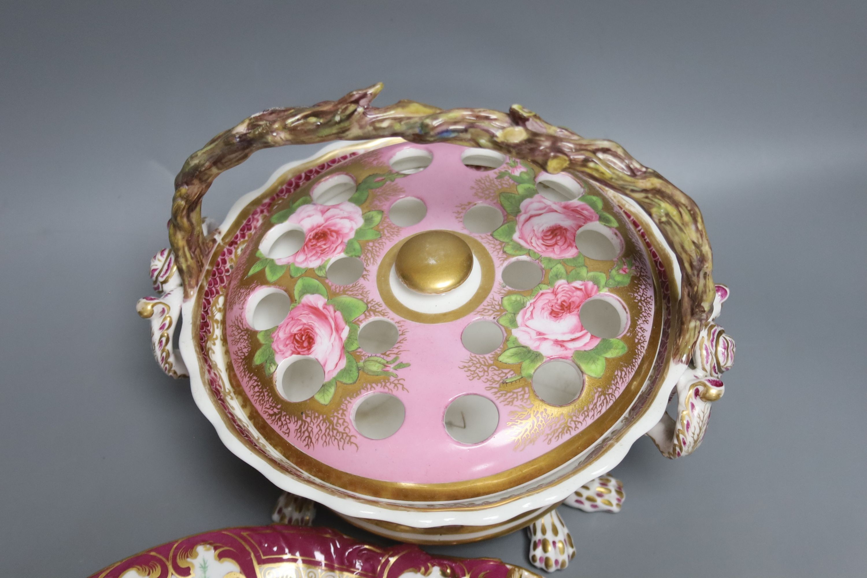 A 19th century English porcelain inkstand, a basket and associated cover and a Spode base, tallest 20cm